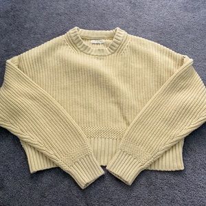 Yellow knitted sweater
